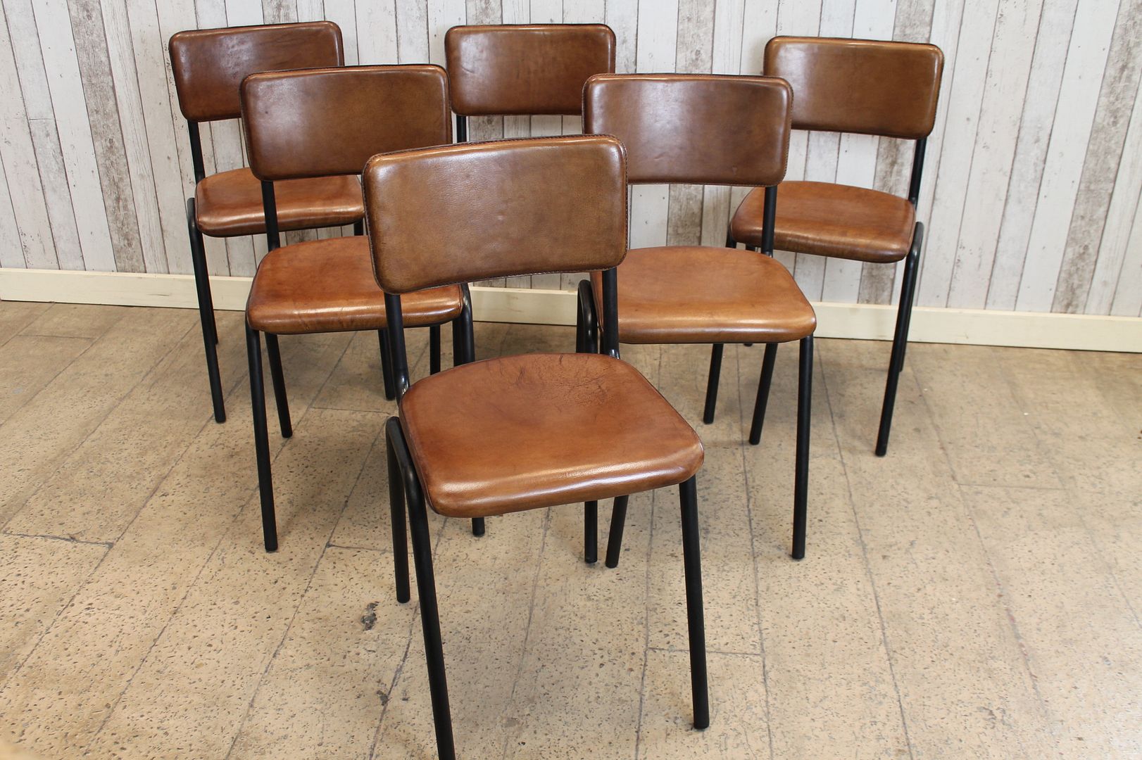 VINTAGE INDUSTRIAL STYLE LEATHER AND METAL STACKING CHAIRS CHELMSFORD