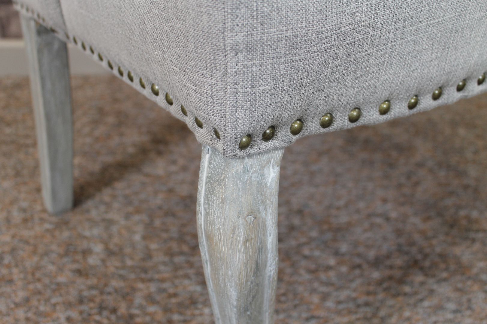 WINGED UPHOLSTERED FRENCH STYLE DINING CHAIRS WITH BUTTON BACK IN STONE