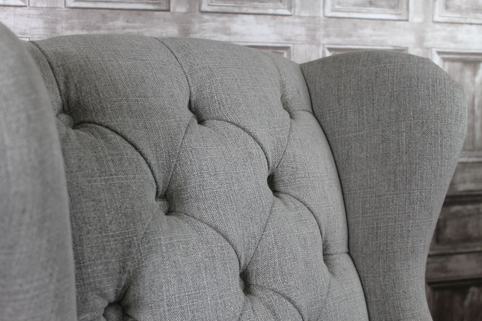 WINGED UPHOLSTERED FRENCH STYLE DINING CHAIRS WITH BUTTON BACK IN STONE