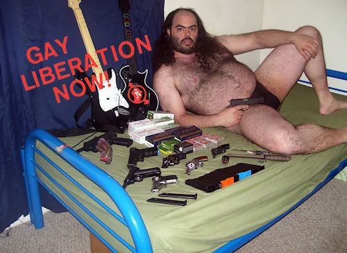 fat_hairy_guy_on_bed_with_gunscopy-1.jpg